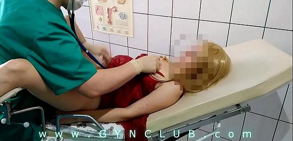  Woman in red dress on gyno exam